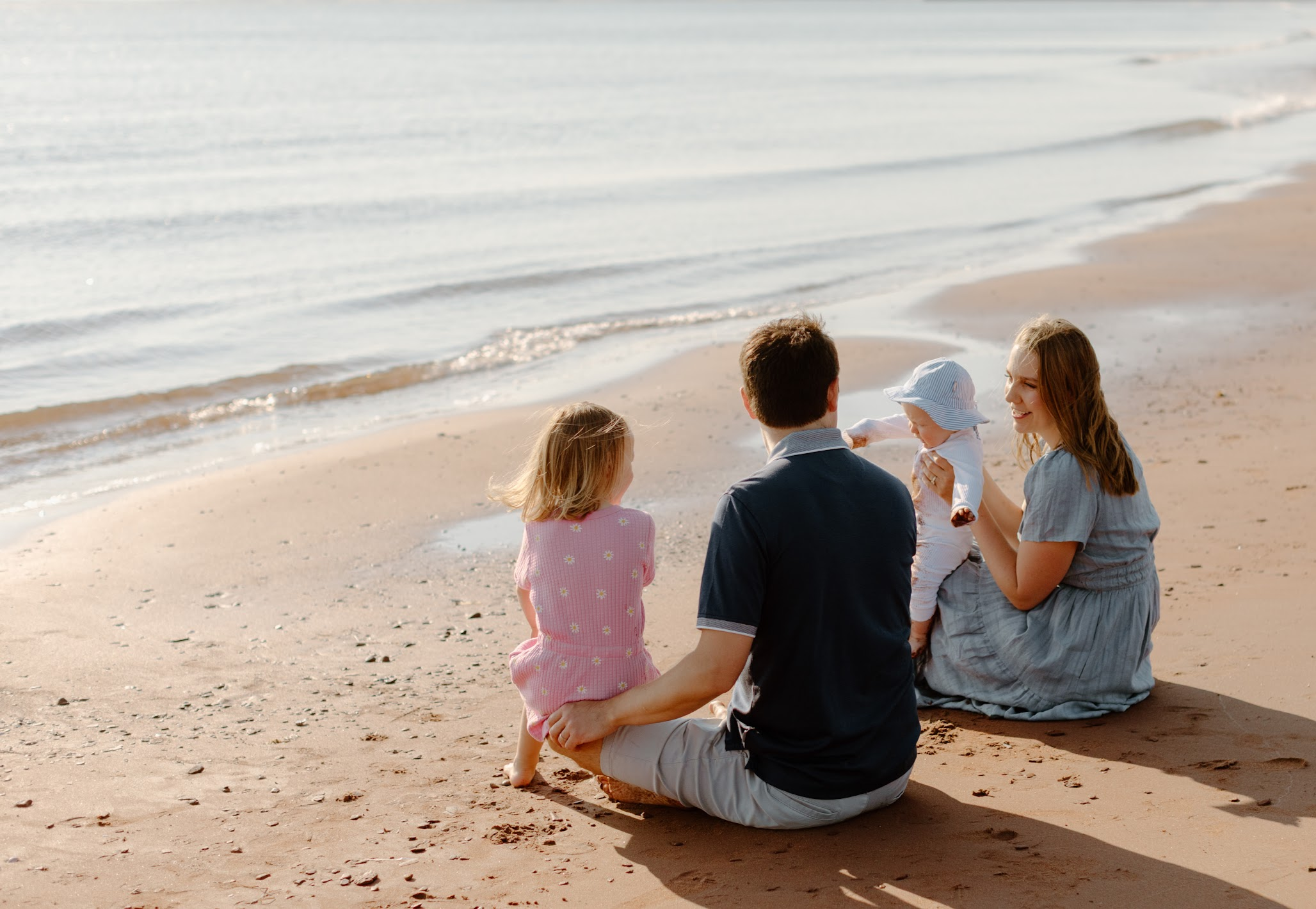 Claire with her family at the beach